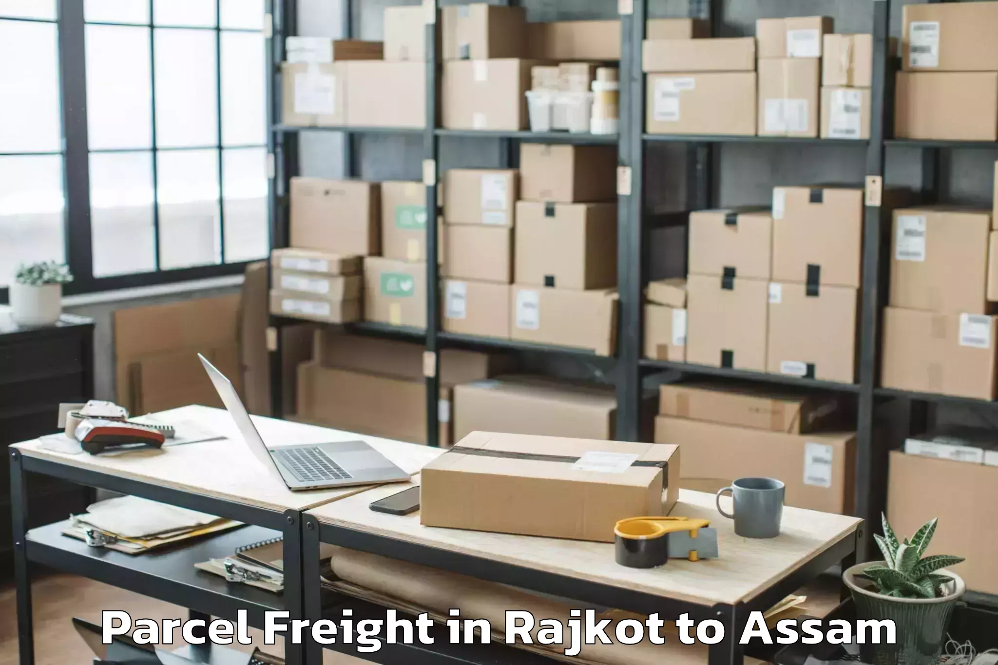 Book Your Rajkot to Dergaon Parcel Freight Today